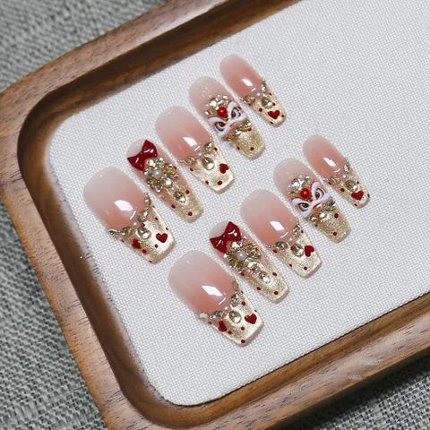 Handmade Lion Dance Press On Nails With 3D Red Bowknot Rhinestones Faux Artificial Pearls Pink Gold Gradient Festive Fake Nails For Women