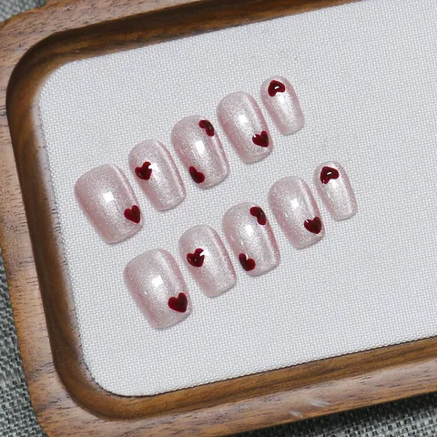 Handgefertigte Katzenaugen-Nägel Zum Aufdrücken Rosa Glitzer Herz Design Sargform Künstliche Nägel Set Für Damen