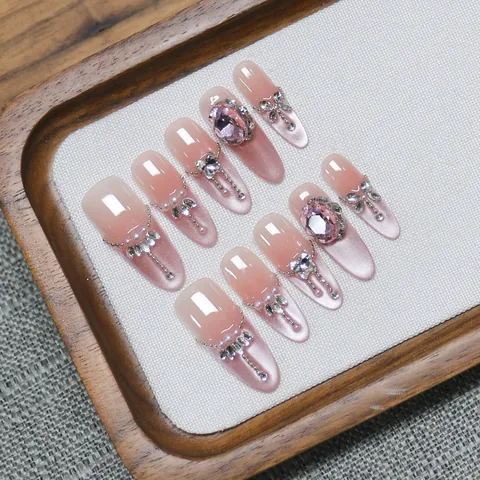 Lussuosi Unghie Finte Fatti a Mano Rosa Occhio di Gatto Con Zircone Perla Artificial Fiocco Lungo Ovale Punte per Unghie per Donna