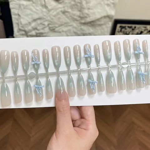 Lange Stiletto Blauw Kattenoog Gradiënt Druk Op Nagels Met 3D Strik Herbruikbare Kunstnagels Voor Vrouwen Dagelijks Feest