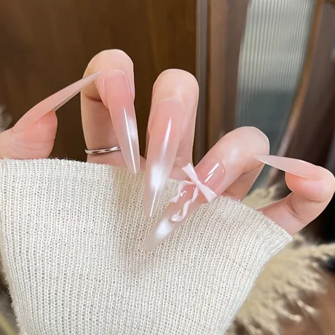 Long Stiletto Press On Nails Nude Pink Gradient Cat Eye Effect With 3D White Bow Detachable Glossy False Nails For Women