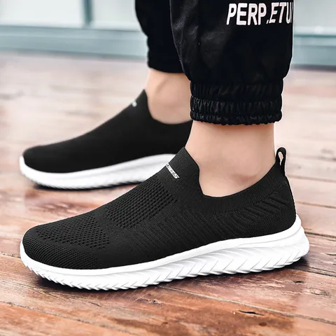 Baskets Décontractées Respirantes Flyknit Slip On pour Hommes Femmes Chaussures de Marche Légères Antidérapantes Chaussures de Course Sport