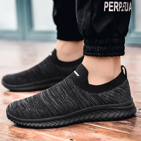 Baskets Décontractées Respirantes Flyknit Slip On pour Hommes Femmes Chaussures de Marche Légères Antidérapantes Chaussures de Course Sport