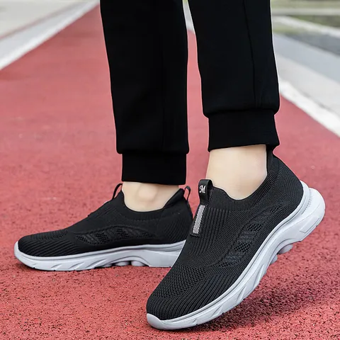 Breathable Flyknit Mesh Slip On Walking Shoes For Men Women Lightweight Non Slip Comfortable Casual Sneakers Soft MD Sole