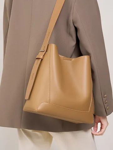 Borsa a Secchiello da Donna in Vera Pelle Grande Capacità in Pelle di Vacchetta Tracolla Minimalista Pendolare Elegante Retro Tinta Unita Tote