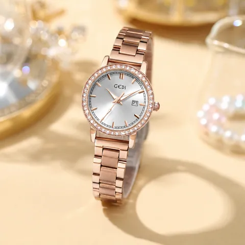 Montre à Quartz de Luxe pour Femme GEDI Étanche Calendrier Lunette en Strass Bracelet en Acier Inoxydable Montre-Bracelet Analogique Exquise