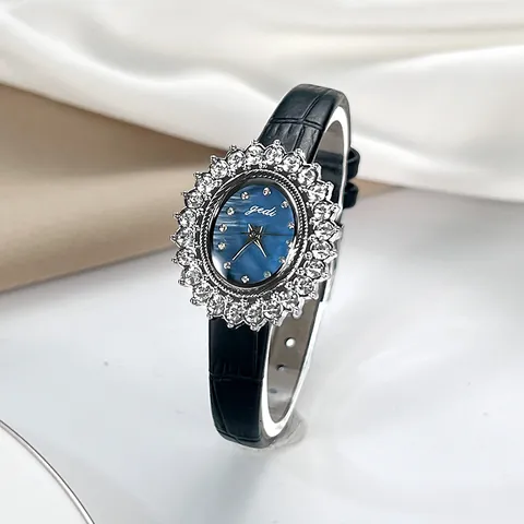Montre Quartz Femme Luxe Tournesol Strass Cadran Ovale Nacre Élégant Bracelet en Cuir Véritable Montre-bracelet