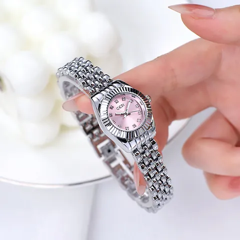 GEDI Montre à Quartz pour Femme Business Luxe Calendrier Étanche Lumineuse Lunette Cannelée Bracelet Jubilé Strass Montre Analogique