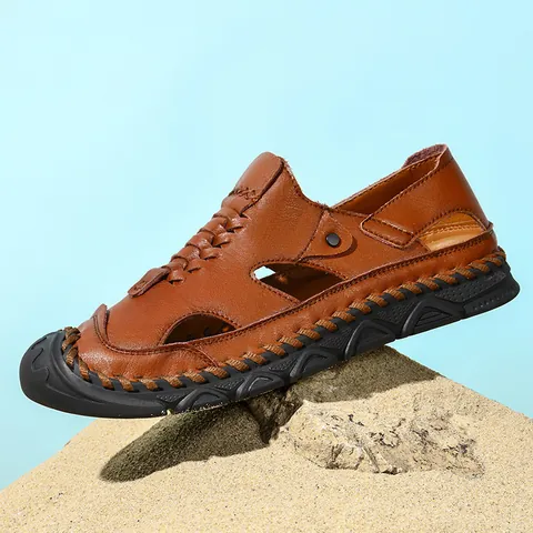 Herren Rindsleder Sandalen Atmungsaktiv Ausgehöhlt Geschlossene Spitze Outdoor Strand Schuhe Casual Handgenäht Rutschfeste Gummisohle Footwear