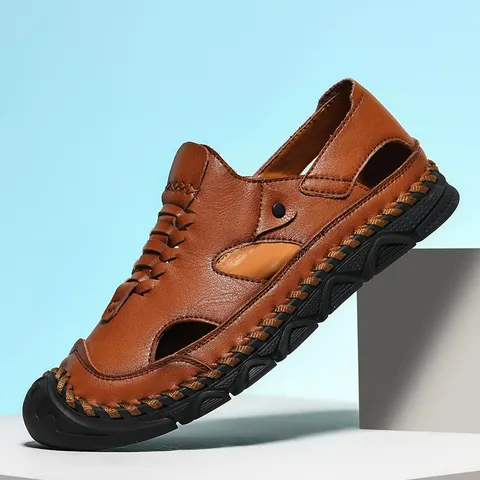 Herren Rindsleder Sandalen Atmungsaktiv Ausgehöhlt Geschlossene Spitze Outdoor Strand Schuhe Casual Handgenäht Rutschfeste Gummisohle Footwear
