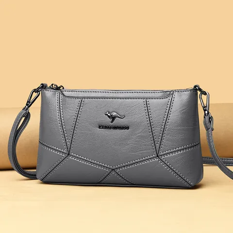 Borsa a Conchiglia in Pelle di Pecora con Giunzione da Donna Piccola Borsa a Tracolla Minimalista con Logo in Metallo Canguro