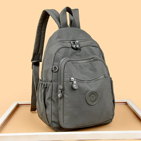 Sac à Dos Décontracté en Nylon Imperméable pour Femmes Sac d'École Multi-Poches Convient pour Ordinateur Portable 13 Pouces Sac à Dos de Voyage Mode