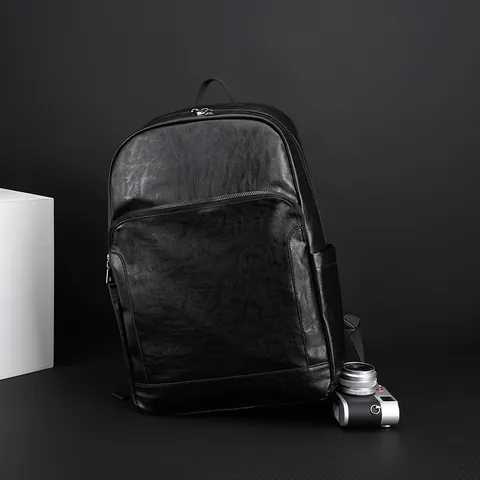 Sac à Dos de Travail pour Homme en Cuir PU Rétro Imperméable Sac pour Ordinateur 14 Pouces Grande Capacité pour Navette Voyage École