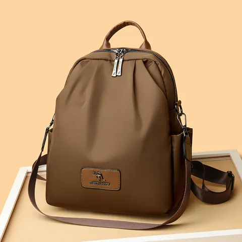 Fashion Lightweight Pleated Nylon Backpack For Women Waterproof Travel Rucksack With Kangaroo Logo Design Black Brown