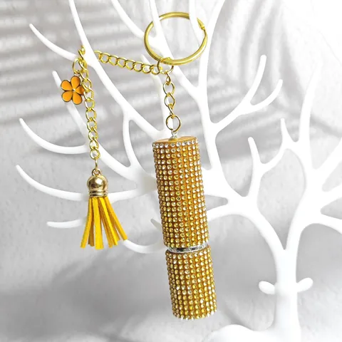 Lussuoso Portachiavi a Forma di Rossetto con Strass e Nappina Pendente a Forma di Fiore Bottiglia di Profumo Scintillante per Borsa Donna