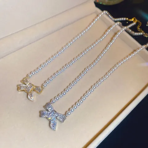 Collar de Perlas Artificiales con Colgante de Lazo de Circonita Chapado en Oro de 18K Estilo Dulce Princesa Gargantilla