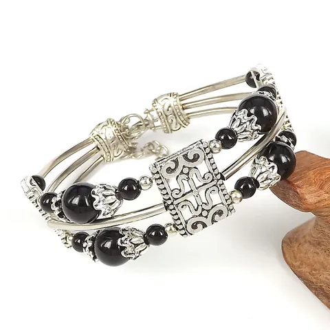 Bracciale a Più Strati in Stile Etnico Bohémien per Donna Vintage in Lega Traforata con Motivo a Volute Bracciale Rigido Regolabile Gioielli