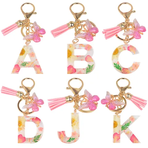 Portachiavi Artigianale con Lettera in Resina Rosa con Fiori Secchi Foglia d'Oro Nappa Farfalla Pendente Moda per Donna Regalo