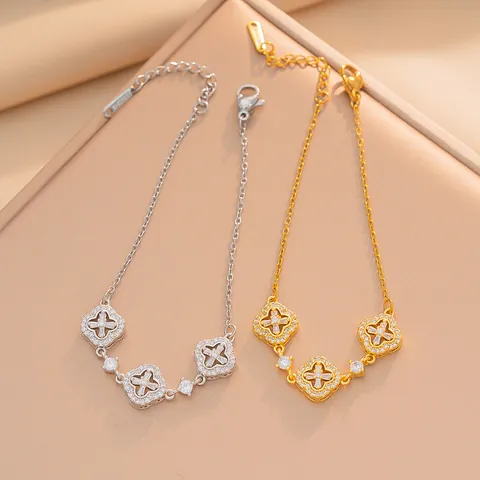 Bracciale con Pendente a Quadrifoglio in Acciaio al Titanio Rame e Strass Gioielli Placcati Oro Argento per Donna