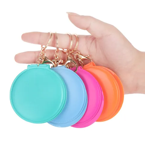 Specchio da Trucco Rotondo Pieghevole Portatile Portachiavi per Donna in Pelle PU Mini Specchio Cosmetico da Tasca Con Chiusura a Moschettone Dorata