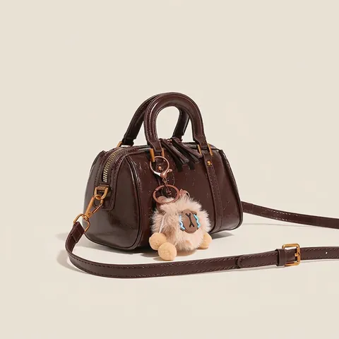 Borsa Boston in Pelle PU Retro per Donna Con Ciondolo in Peluche Borsa a Tracolla Piccola Borsa a Cuscino Chic Street Style