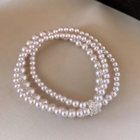 Elegante Bracciale di Perle Artificiali Intarsio di Zirconia Ciondolo a Farfalla e Conchiglia Gioielli Vintage Francesi per Donna Regalo