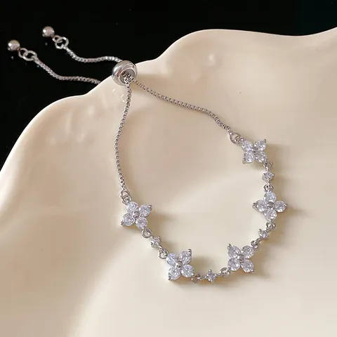 Elegant Copper Zirconia Flower Diamond Adjustable Slider Bracelet For Women Sparkling Inlaid Four-Petal Flower Bracelet Jewelry