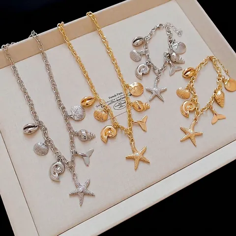 Set di Collana e Bracciale con Ciondoli a Tema Oceano Conchiglia Stella Marina Gioielli in Lega e Perla Artificiale per Donna Vacanze Estive Regalo di Moda