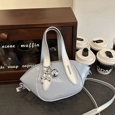 Fashion Women PU Leather Bucket Bag Shell Shaped Small Crossbody Shoulder Bag With Metal Balloon Dog Charm Daily Handbag