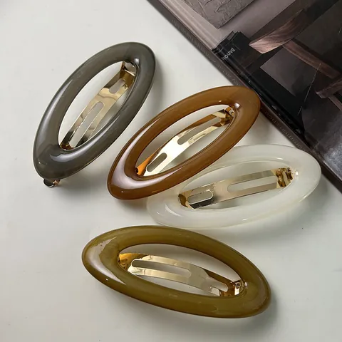 Elegante Fermaglio per Capelli in Acrilico Vintage per Donna Retrò Ovale Scavato Geometrico Clip a Molla Copricapo