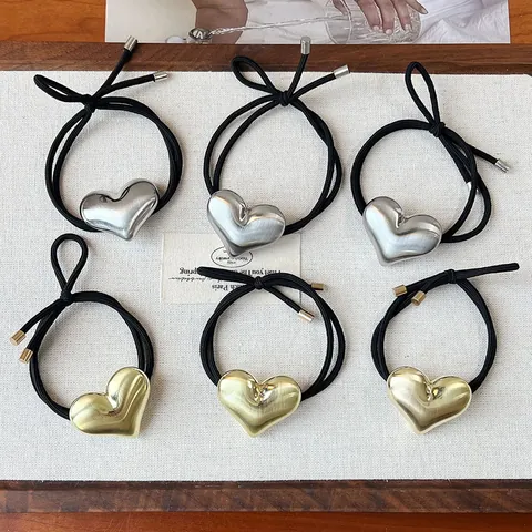 Minimalista Aleación Metal Corazón Estrella Geométrico Goma de Pelo Estilo Coreano Alta Elasticidad Banda de Pelo Oro Plata Moda Mujer Accesorios de Pelo