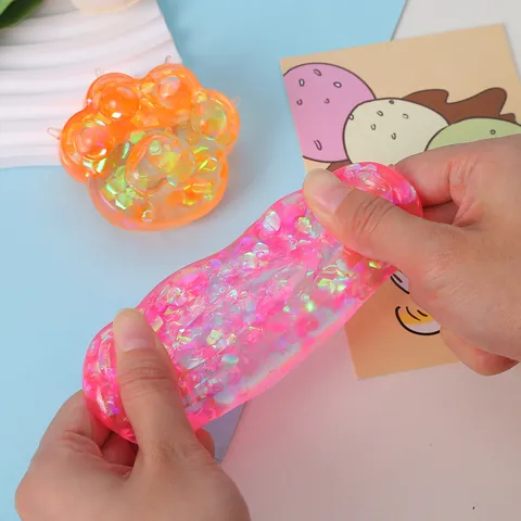 Jouet Moelleux en Forme de Patte de Chat Avec Paillettes Colorées Brillantes Silicone Maltose Anti-Stress Jouet à Presser pour Enfants Adultes Décompression