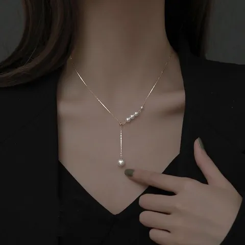 Luxus Künstliche Perle Quaste Anhänger Halskette Kupfer Galvanisiert Y-förmige Schlüsselbeinkette Trendiger Eleganter Damenschmuck Accessoire