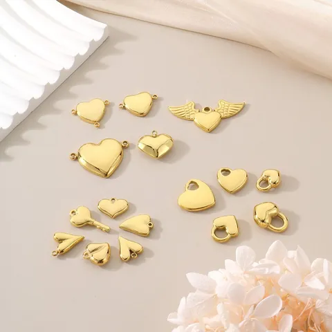 Ciondoli Cuore Placcati Oro Acciaio Inossidabile Ciondoli Per Creazione Gioielli DIY Cuore Alato Serratura Chiave Connettori Lucidato