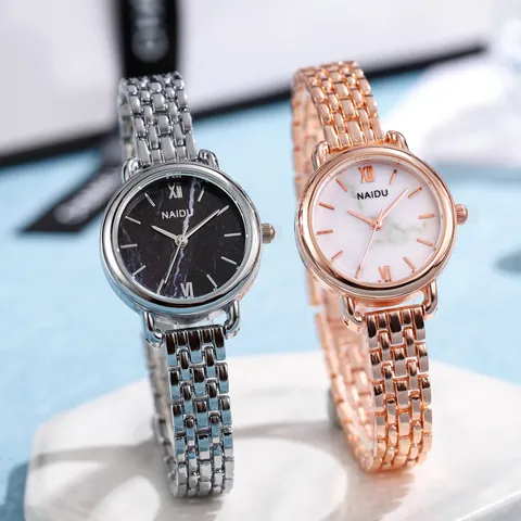 Montre à Quartz pour Femme Luxe Alliage Bracelet en Maille d'Acier Cadran Motif Marbre Chiffres Romains Montre-Bracelet Décontractée