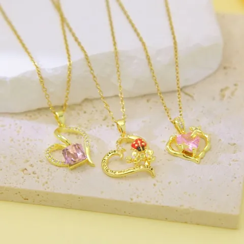 Collana con Pendente a Cuore in Acciaio al Titanio per Donna Placcata in Oro con Perle Artificiali e Strass Gioielli da Collo Eleganti