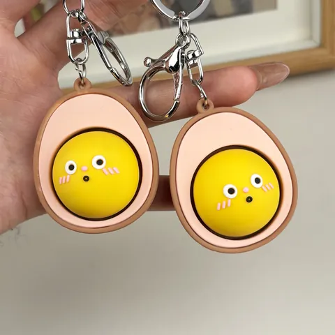 Llavero Creativo de Alivio del Estrés de Huevo de Dibujos Animados Lindo PVC Botón Juguete Blando Encanto de Bolsa para Niños Adultos
