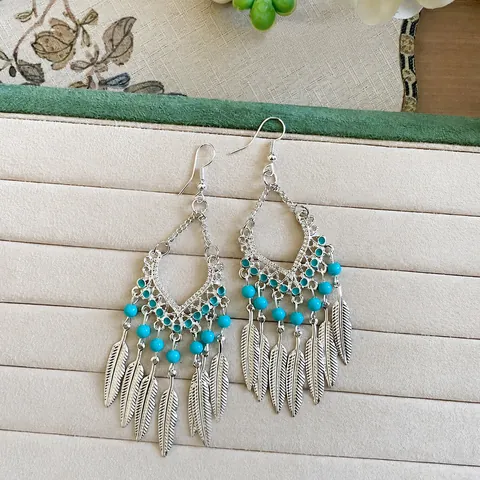 Böhmische Vintage Hohle Geometrische Feder Quasten Ohrringe Für Damen Legierung Acryl Blaue Perle Ethno Stahlstift Schmuck