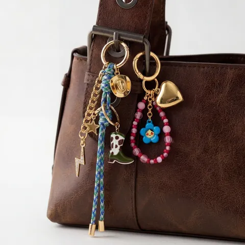 Vintage Elegant Heart Flower Bag Charm Pendant For Women Woven Rope Metal Chain Bohemian Evil Eye Cowboy Boot Bag Accessory