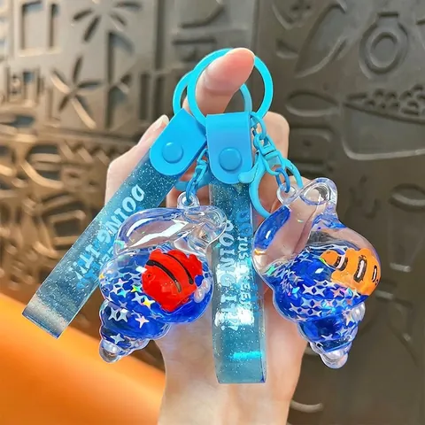 Ocean Series Oil Filled Conch Keychain Liquid Floating Dolphin Clownfish Drifting Bottle Acrylic Pendant Cute Bag Hanging Accessory