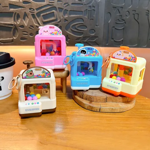 Mini Claw Machine LED Glowing Stress Relief Toy Cartoon Animal Keychain Creative Cute Grab Ball Machine For Kids Adults