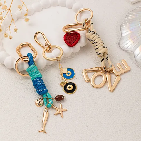 Fashion Zinc Alloy Bag Charm Keychain With Evil Eye Heart Sea Star Pendant Braided Rope DIY Bag Accessories For Women Jewelry
