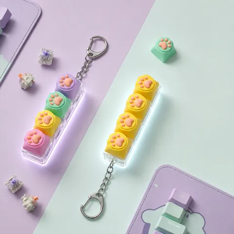 Macaron LED Leuchtende Katzenpfote Stressabbau Schlüsselanhänger Mechanisches Gefühl Weichgummi Pfote Rucksack Anhänger Spielzeug Geschenk