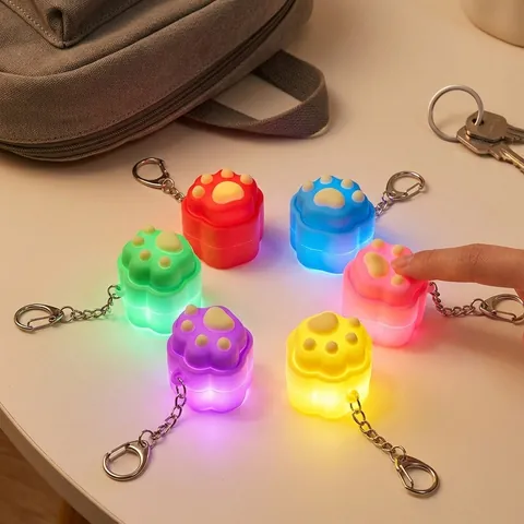 Kreativer 3D Katzenpfote Leuchtender Squishy Schlüsselanhänger Stressabbau Quetschspielzeug Macaron Farbe PVC LED Rucksack Anhänger