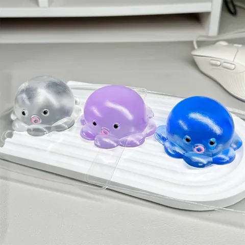 Durchscheinender Oktopus Squishy Spielzeug Malzzucker Textur Weich TPR Stressabbau Neuheit Dekompressionsspielzeug Damen