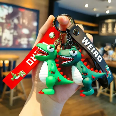 Süßer Cartoon Dinosaurier Schlüsselanhänger 3D Weiches Silikon Tier Anhänger Buchstabe Druck Riemen Tasche Ornament Auto Schlüsselring Schmuck Geschenk