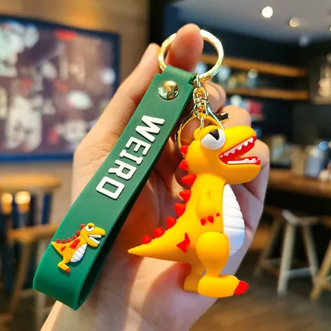 Süßer Cartoon Dinosaurier Schlüsselanhänger 3D Weiches Silikon Tier Anhänger Buchstabe Druck Riemen Tasche Ornament Auto Schlüsselring Schmuck Geschenk