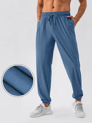 Heren Sneldrogend Koel Gevoel Nylon Sportbroek Losse Pasvorm Stretch Joggers Voor Fitness Hardlopen Outdoor Training Onderkant