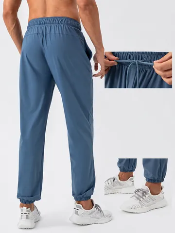 Heren Sneldrogend Koel Gevoel Nylon Sportbroek Losse Pasvorm Stretch Joggers Voor Fitness Hardlopen Outdoor Training Onderkant