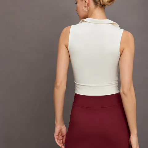 Dames Sport Polo Mouwloze Top En Contrastkleur Patchwork Golvende Tennisrok Yoga Fitness Training Sportkleding